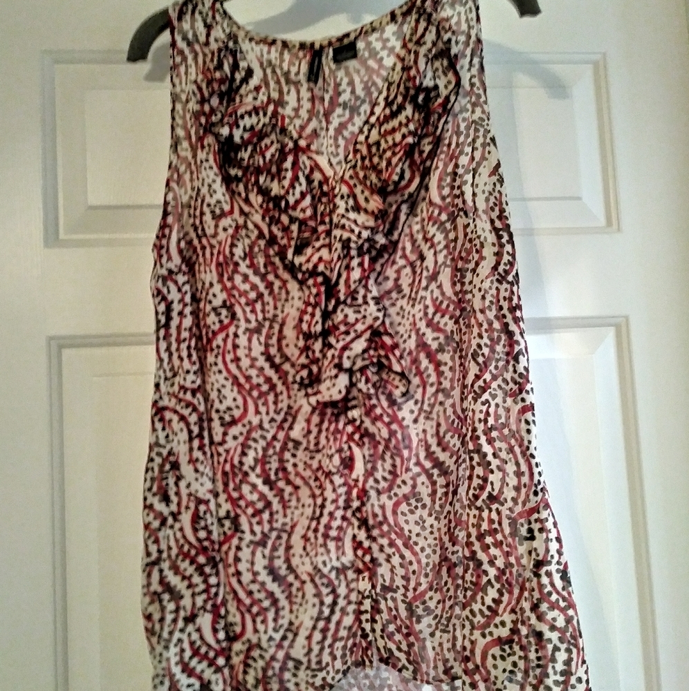 Shark bite, sleeveless shirt